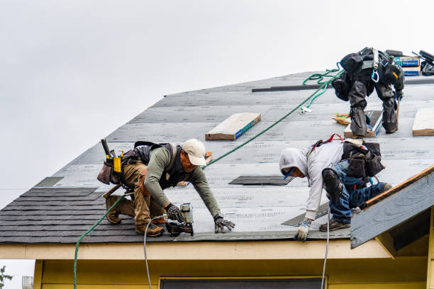 Professional Emergency Roof Repair technician working in Bayside, WI